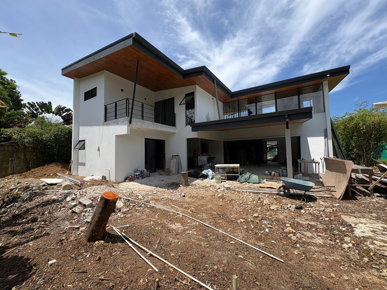 Two-storey home under construction with site works in progress