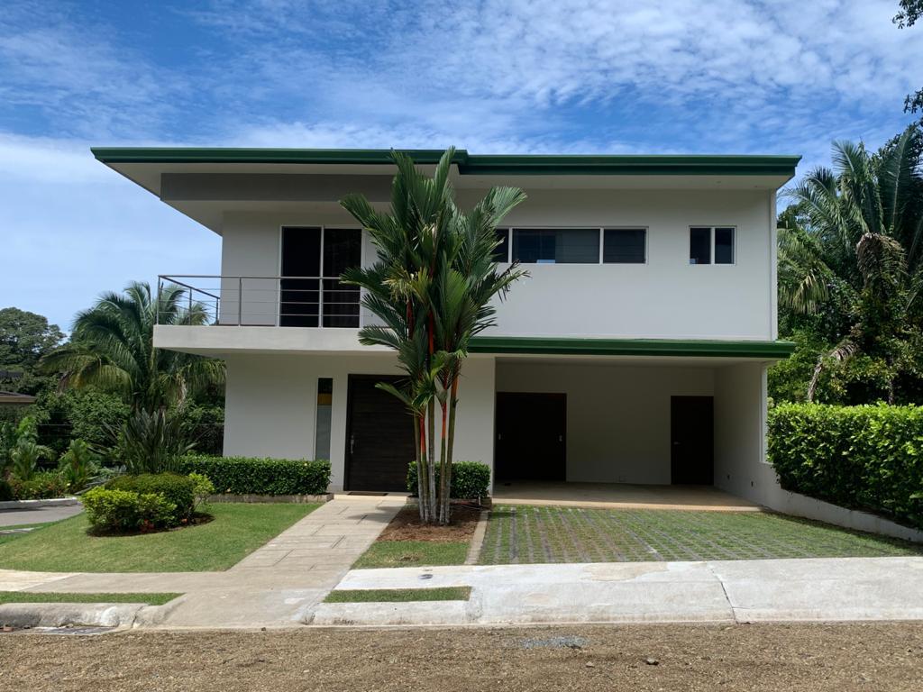 Two-storey custom home with landscaped grounds